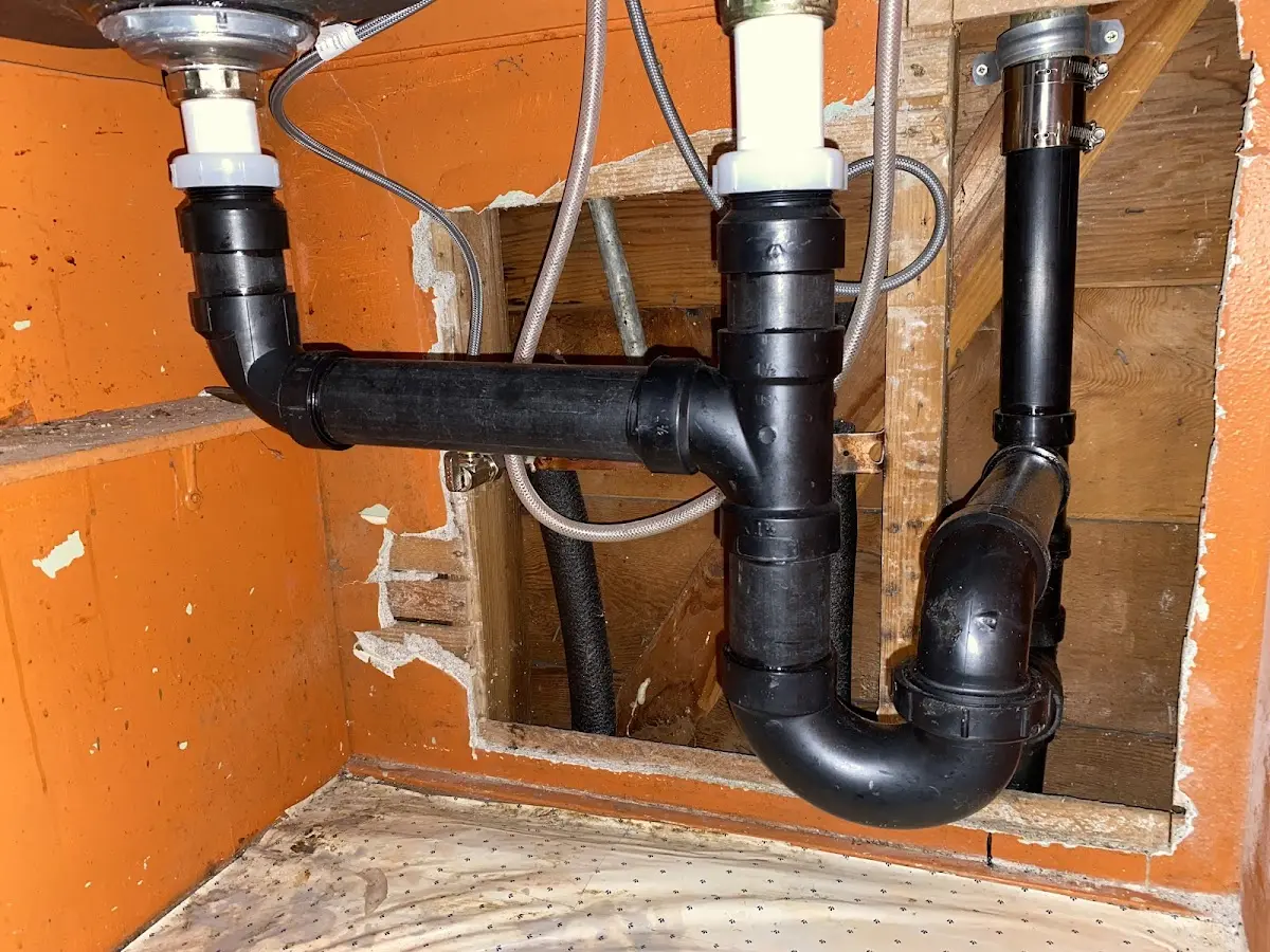 Professional Garbage Disposal Repair equipment and tools on the job in Jefferson City